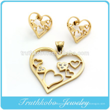 Corte láser de alta calidad en forma de corazón de acero inoxidable pendiente y colgante conjunto de joyas de cristal para baño de oro